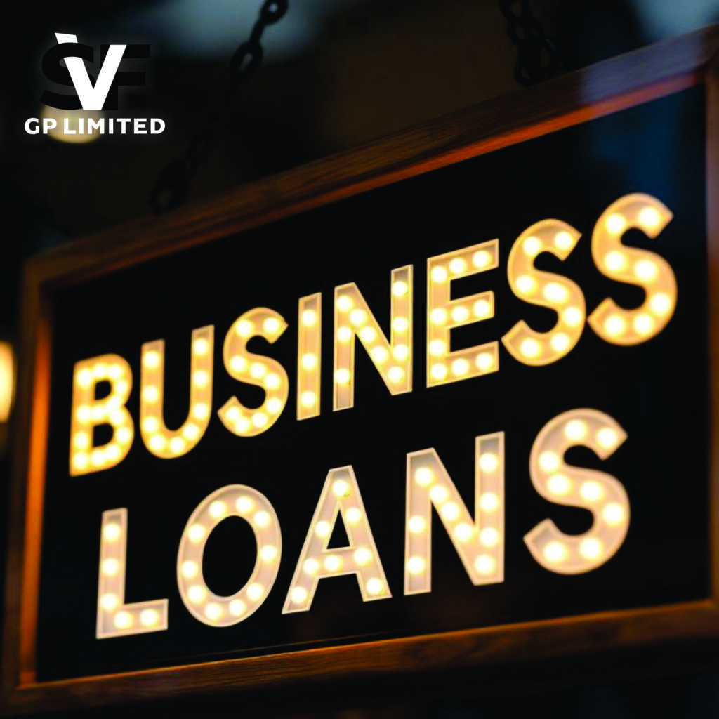 Illuminated sign reading “Business Loans,” representing financing options for established companies.
